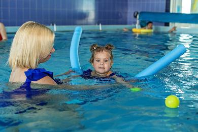 mum and toddler in the pool