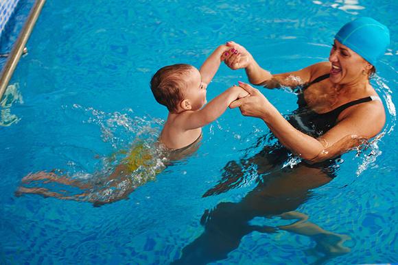 mum and baby in pool